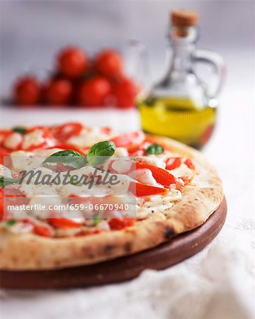 Pizza Margherita (pizza with tomatoes, mozzarella, basil)