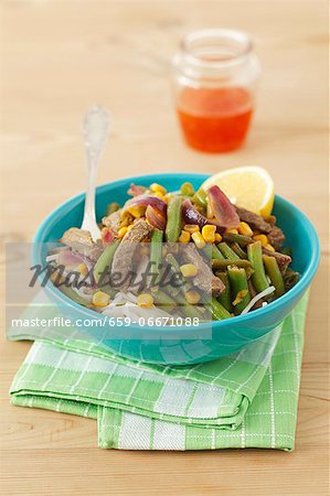 Beef with green beans and sweetcorn on rice noodles