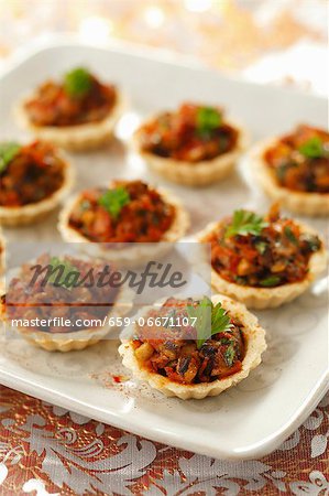 Ham and mushrooms tartlets