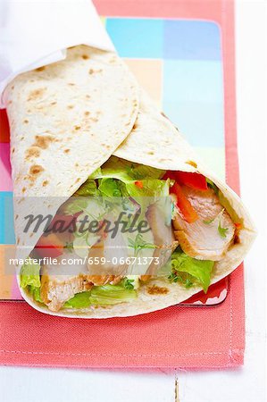 Chicken, salad and tomato wrap Chicken, salad and tomato wrap