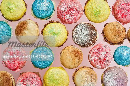 An assortment of macaroons arranged in rows, viewed from above