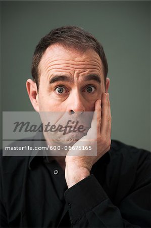 Head and Shoulders Portrait of Wide-eyed Mature Man Head and Shoulders Portrait of Wide-eyed Mature Man