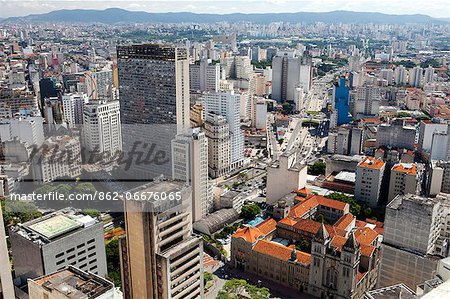 South America, Brazil, Sao Paulo; view of Sao Paulo city from the top of the Banespa Tower, showing Avenida 23 de Maio and the Benedictine Monastery, college and Basilica of St. Benedict designed by German architect Richard Berndl