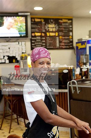 South America, Brazil, Sao Paulo, a waitress in a cafe in the Sao Paulo Municipal Market in the city centre