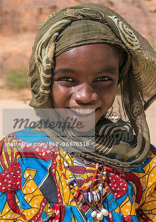 Chad, Wadi Archei, Ennedi, Sahara.  A smiling Toubou girl.
