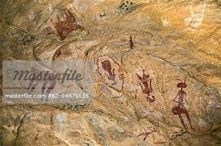 Chad, Tchad, Terkei West, Ennedi, Sahara.  Ancient rock art painted on the domed ceiling of a small cave or shelter.