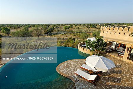 India, Rajasthan, Rohet, Mihir Garh. Despite boasting a small infinity pool, Mihir Garh, or Sun Fort, is a luxury hotel built to resemble a medieval Rajput fortress.