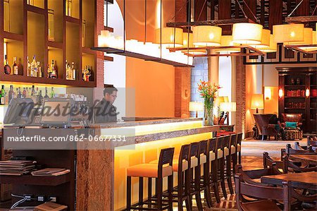 South America, Peru, Cusco, Marriott hotel, a waiter at the colonial era bar of the hotel which is housed in a former Spanish conven