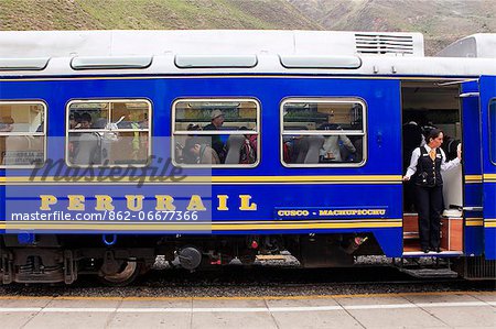 South America, Peru, Cusco, Sacred Valley, Ollantaytambo. The Vistadome train which runs between Machu Picchu and Cosco Poroy, at Ollantaytambo railway station.