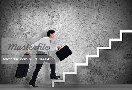 Businessman climbing the stairs to the top Businessman climbing the stairs to the top
