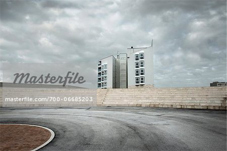 Modern Building with Stone Steps on Cloudy Overcast Day, Ostia Lido, Rome, Lazio, Italy