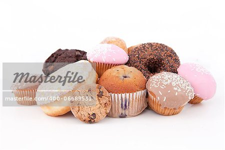 Cakes laid out together against a white background