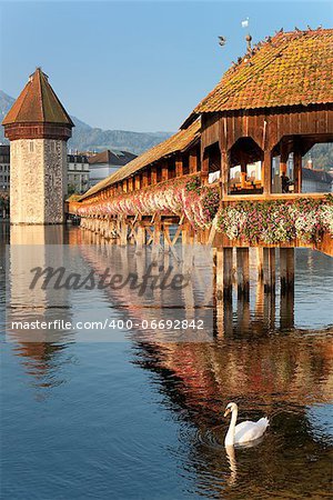 Wonderful morning view on Chapel Bridge and Water Tower in Luzern, Switzerland.