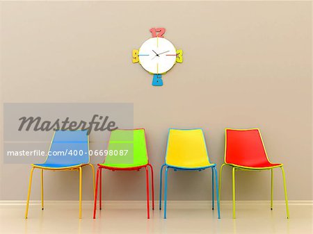Brightly colored chairs and clock in the waiting room