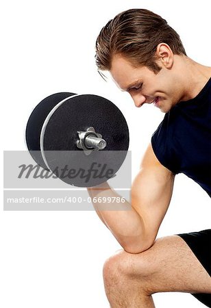 Portrait of young fit trainer working out with dumbbells isolated over white