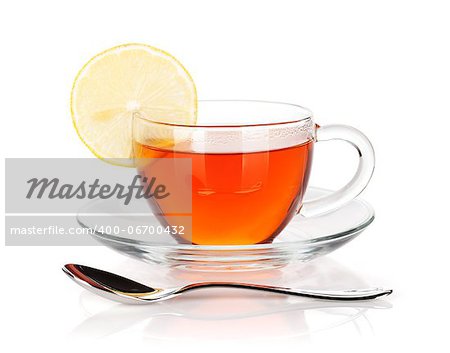 Glass cup of black tea with lemon slice and spoon. Isolated on white background