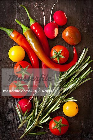 Fresh ripe vegetables on a wooden board.