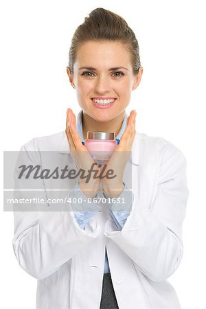 Happy cosmetologist woman showing creme