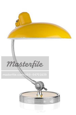 Retro yellow table lamp on on white background.