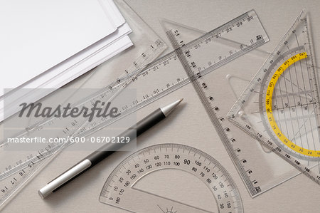 Overhead View of Geometry Set Tools with Pen and Paper, Studio Shot Overhead View of Geometry Set Tools with Pen and Paper, Studio Shot