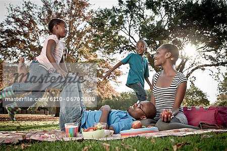 African family picnic together in a park