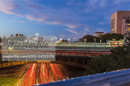 Streaks of traffic lights on the road under a bridge, Charles Street, Charles MGH Station, Longfellow Bridge, Boston, Massachusetts, USA