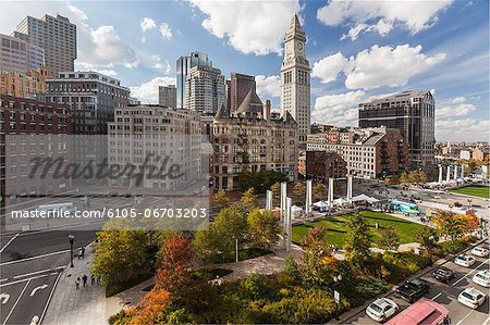 Skyscrapers in a city, Rose Kennedy Greenway, Custom House, Grain Exchange Building, Boston, Massachusetts, USA Skyscrapers in a city, Rose Kennedy Greenway, Custom House, Grain Exchange Building, Boston, Massachusetts, USA