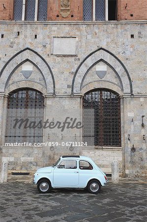 Building and car in Siena, Italy