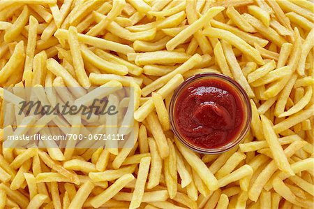 still life of french fries with ketchup