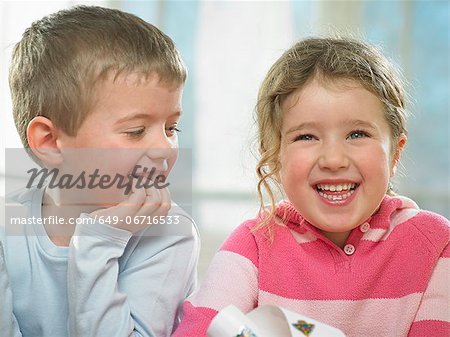 Children laughing together indoors