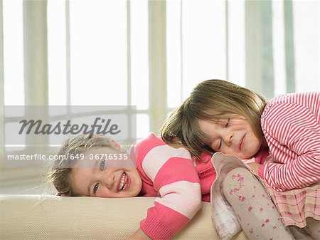 Girls playing together indoors