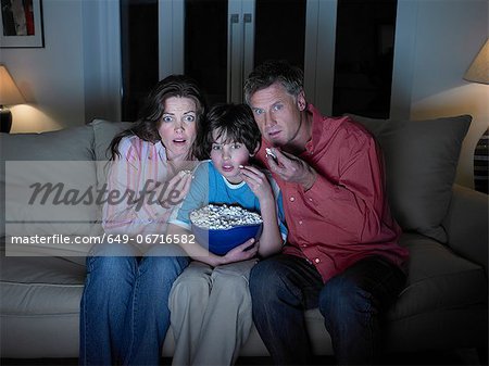 Family watching movie together