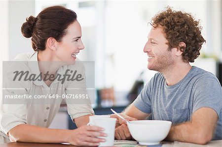 Couple talking at breakfast