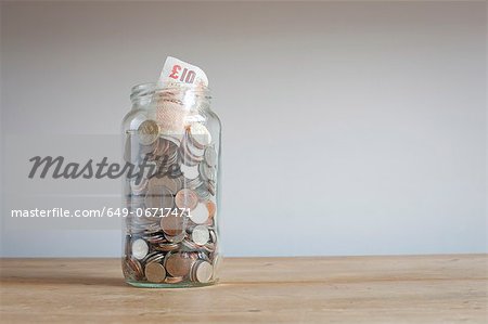 Savings jar on desk