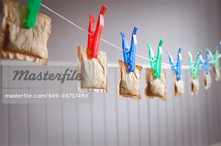 Teabags hanging from clothesline