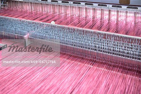 Thread on loom in textile mill