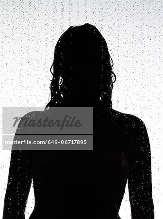 Silhouette of woman in shower