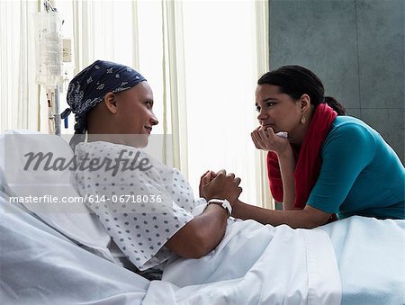 Daughter visiting mother in hospital Daughter visiting mother in hospital