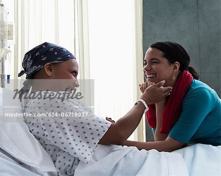 Daughter visiting mother in hospital