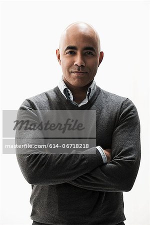 Portrait of businessman with arms folded