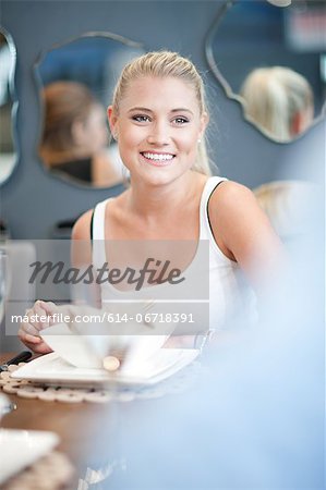 Woman smiling at dinner table