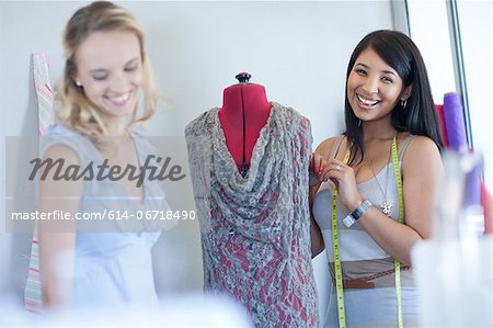 Dressmakers working in studio