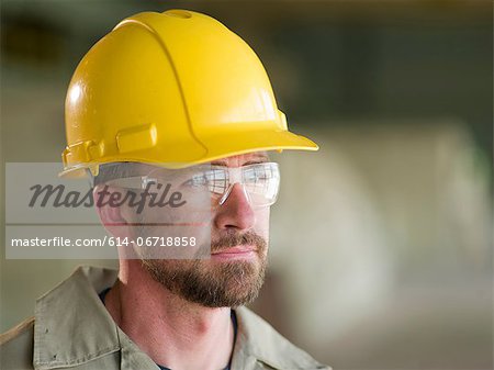 Engineer wearing hard hat on site