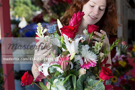 Florist arranging bouquet in shop