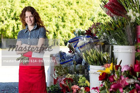 Florist smiling in shop
