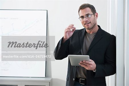 Businessman using tablet computer