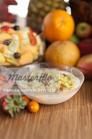 Bowl of fruit salad on table