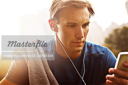 Runner listening to mp3 player