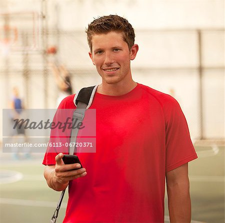 Man standing on basketball court