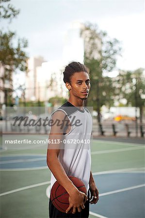 Man standing on basketball court